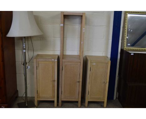 THREE MODERN LIGHT WOOD SINGLE DOOR CABINETS, ONE WITH OVER SHELF, LARGEST 160CM HIGH