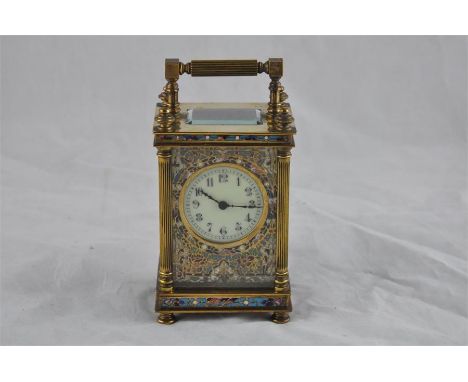 A 19th century lacquered brass and champlevé enamel carriage clock, with single train movement and compensated balance to an 