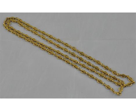 An 18ct. yellow gold long and short link chain,&nbsp;being formed from alternating elongated bar links enclosing rope texture