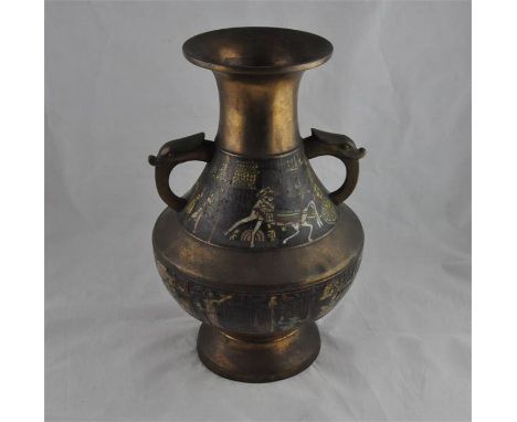 A 19th century Chinese brass twin handled vase, with simulated cloisonné decoration in the Egyptian taste, seal mark to base,