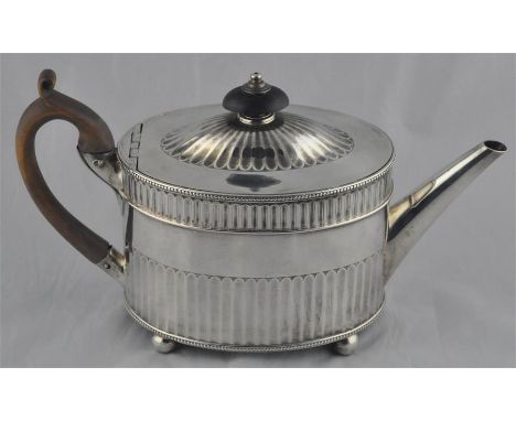 A George III silver teapot, by John Wakelin &amp; William Taylor, London 1783, of oval form and Neo-classical design, having 