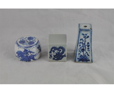 Three early 20th century Chinese blue and white pieces, to include a square seal, the sides comically painted with dragons, 6