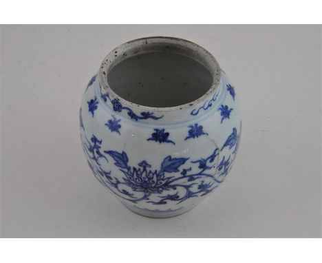 A Chinese transitional style vase, with Lotus decoration, possibly of the period. (at fault). 11cms high.&nbsp;