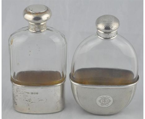 a silver and glass hip flask,&nbsp;London 1916, the glass flask of oval cross-section, having faceted straight sides, with pl
