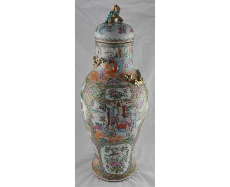 A large Chinese Canton Export Famille rose baluster vase, with cover in typical palette decorated with figures and butterflie