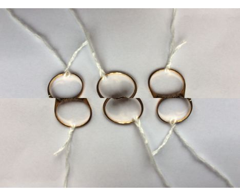 An 18ct. gold and diamond crossover ring, having row of round brilliant cut diamonds, shank stamped "18ct", (gross weight 2.5