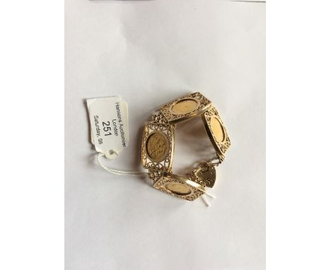 Four gold half sovereigns mounted in a 9ct. gold bracelet,&nbsp;the yellow gold bracelet having four rectangular form openwor