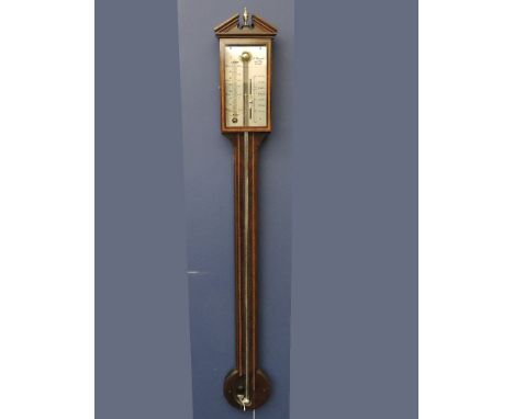 An inlaid mahogany stick barometer, with silvered calibrated dial, by A Committi & Sons, London