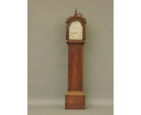 An early 19th century longcase clock, the arched painted dial inscribed 'J N Symonds Reedham', with 8 day movement, 226cm hig