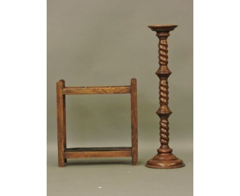 An oak stick stand, a beechwood jardinière stand, and a grain measure