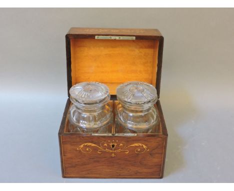 A 19th century French rosewood and inlaid tea caddy