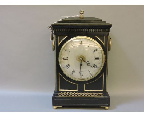 A Regency period ebonised bracket clock, with single fusee movement and alarm, 8in silvered dial and with brass grills, ring 