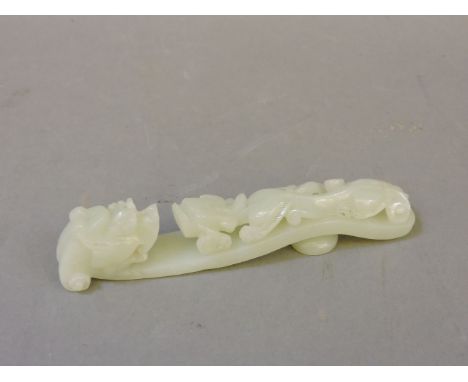 A Chinese jade belt hook, 12cm long
