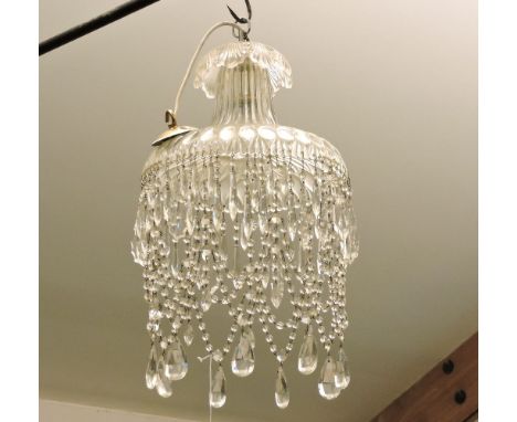 A hanging glass ceiling light, with dome top and chains, with lustre beads and drops, 50cm high