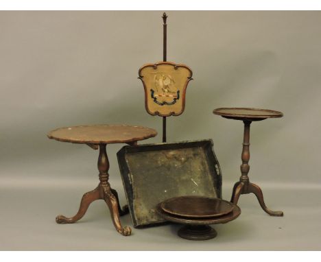 A George III dish top mahogany tripod table, together with a further tripod table, an ebonised butler's tray, a lazy Susan, a