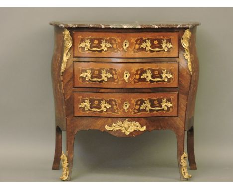 A French inlaid serpentine fronted bombe commode, 89cm high