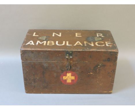 A painted pine First Aid box, inscribed 'LNER AMBULANCE', 39.5cm wide