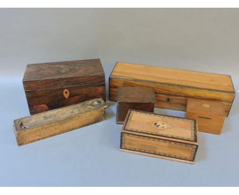 A Victorian rosewood tea caddy, incomplete, an olivewood glove box, 37cm long, and four further boxes