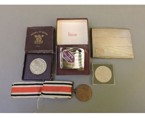 A silver engine turned cigarette case, a Ronson lighter, a Festival of Britain coin, a commemorative five shilling coin, and 