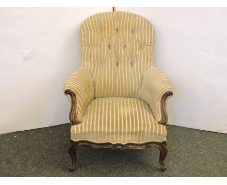 A William IV rosewood and button upholstered armchair, carved scrolling acanthus leaf legs, 74cm wide
