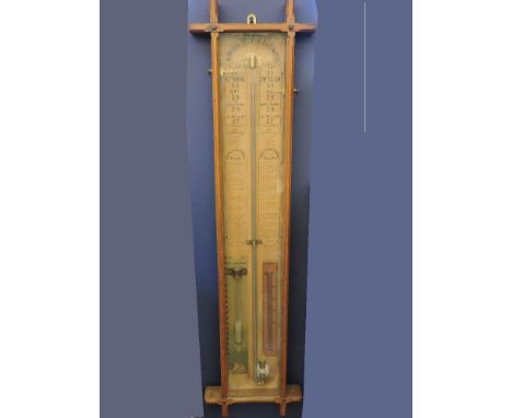 An Admiral Fitzroy barometer, in a light oak case, 104cm high