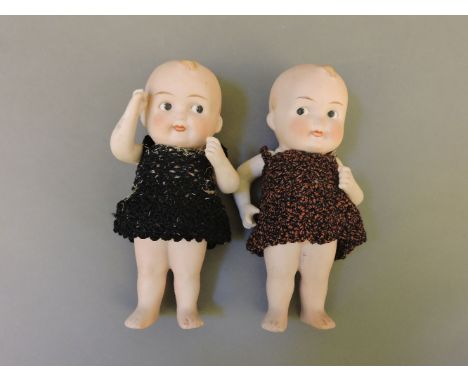 Two Kewpie style bisque dolls, P3/I, 17cm high