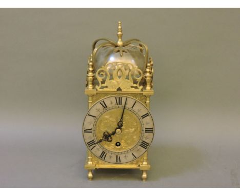 A small brass 'lantern' clock, with platform escapement, non striking, 27cm high
