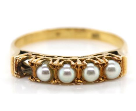 Pearl and 18ct gold ring marked K18. Prong set round white pearls with one missing. Approx weight 2.5 grams, ring size N. Wit
