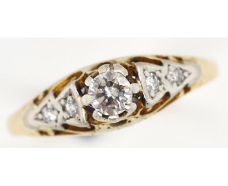 Antique 18ct gold and diamond ring Approx 2.8mm round cut center diamond and diamond set shoulders. Marked rubbed 18ct mark, 