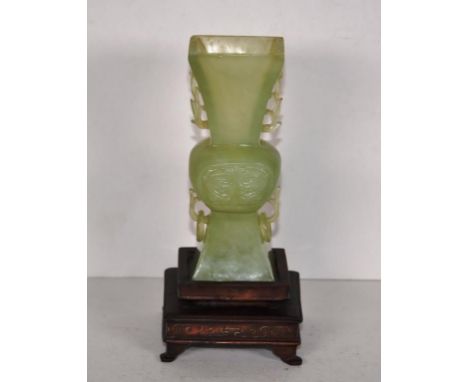 Chinese carved jade vase with leaf decorated handles &amp; on a timber stand, 16.5cm high including stand approx.