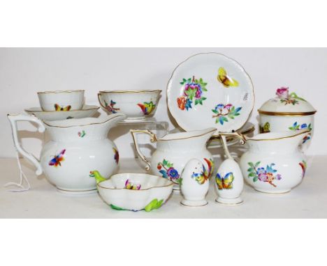 Thirteen pieces Herend Queen Victoria tableware each of hand painted floral and butterfly decoration, including pair cream ju