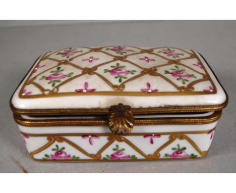 Limoges France hand painted ceramic trinket box floral decorated, with gilt highlights, (length 10.5cm approx)