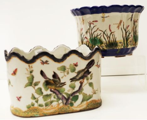 Two Chinese ceramic jardinieres 1 circular, the other oval shaped, each with bird and foliage decoration, marked to bases. (H