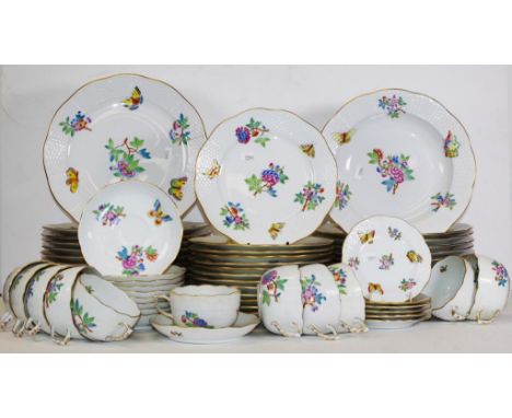 Sixty three piece Herend Queen Victoria dinner set each piece of hand painted floral and butterfly decoration, including 12 d
