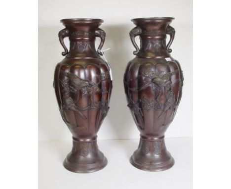 Pair of Japanese bronze lamp bases of vase form &amp; with bird decoration, 43cm high approx.