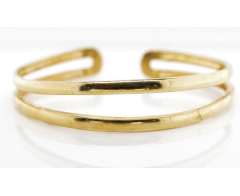 9ct gold bangle split flat wire marked 375 GM approx 11.7 grams weight, 55mm inside width. * Repaired
