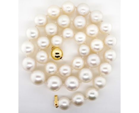 Broome white pearl and 18ct gold necklace marked 750 to ball clasp approx 35x near round white pearls measuring 12mm -14.7mm.