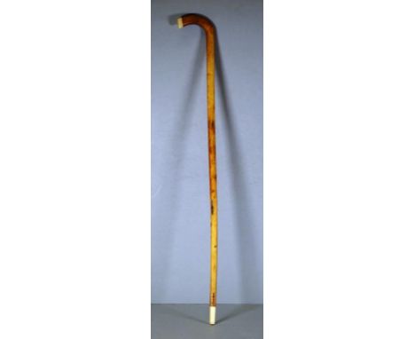 Vintage bone walking cane with ivory capped handle and ferule. NB This item may not be exported without CITES documentation. 