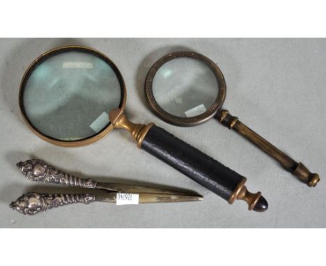 Two vintage magnifying glasses one marked Henry Hughes Son Ltd London 1941, a framed print &amp; a silver handled stretchers