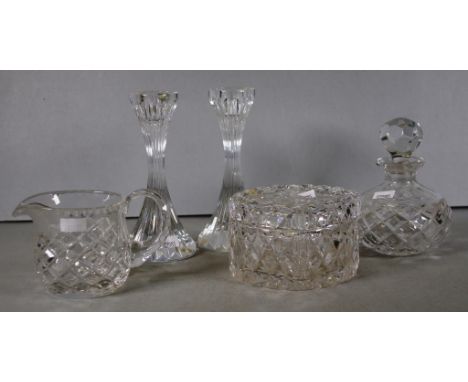 Pair of Waterford crystal candlesticks together with a cut crystal perfume bottle, lidded trinket box and a perfume bottle