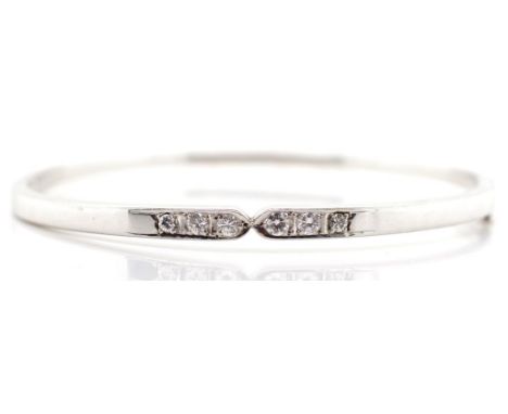 Diamond and 14ct white gold bangle with hinge, push button clasp and safety catch. marked 585, approx 12 .2 grams weight, 50m