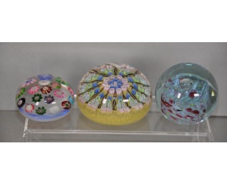 Three vintage glass paperweights to include 2 Millifiori,and 1 signed art glass