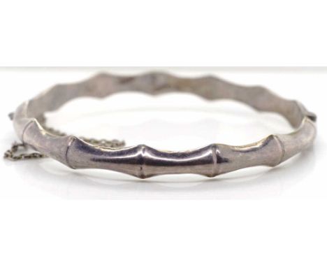 Sterling silver "bamboo" bangle hinged with box clasp and safety chain. Marked Sterling 925 approx 9 grams weight, 58mm x 60m