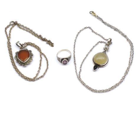 Group of silver jewellery amethyst set marked 925 ring and marked 925 pendants. Both the chains are unmarked. Ring size Q, ch
