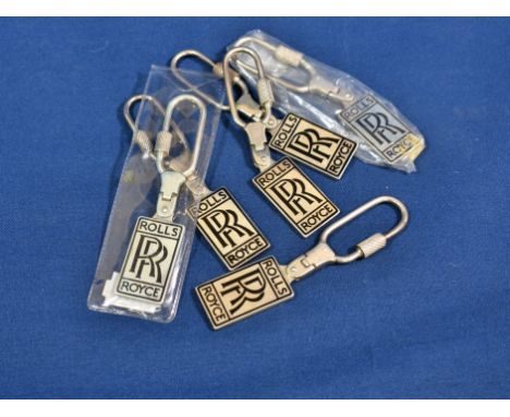 Six sterling silver and enamel Rolls-Royce keyrings 