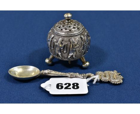 A Chinese silver pounce pot probably late 19th/early 20th century, the cylindrical pot raised on tripod feet, the base with s