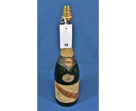 An unusual recycled 1949 Champagne bottle lamp.