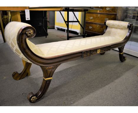 A bedroom bench with cream silk upholstery, scroll arms and feet, carved floral and gilt decoration (160cm x 59cm) 