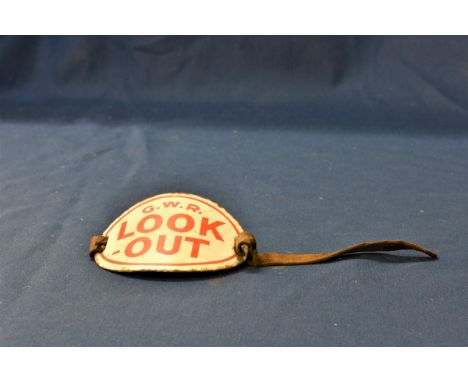 Railwayana - GWR Great Western Railway enamel "LOOK OUT" armband of oval, curved shape, G.W.R. LOOK-OUT, red lettering, on wh