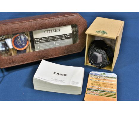 Four watches, a cased Casio Protrek PRG-270 3415, A Citizen Eco Drive E011 S072226-KA, an Armani AR-5864 and a Citizen WR200 